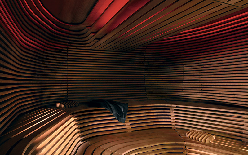 Interiér sauny Biorythm Klafs s designovým řešením obložení